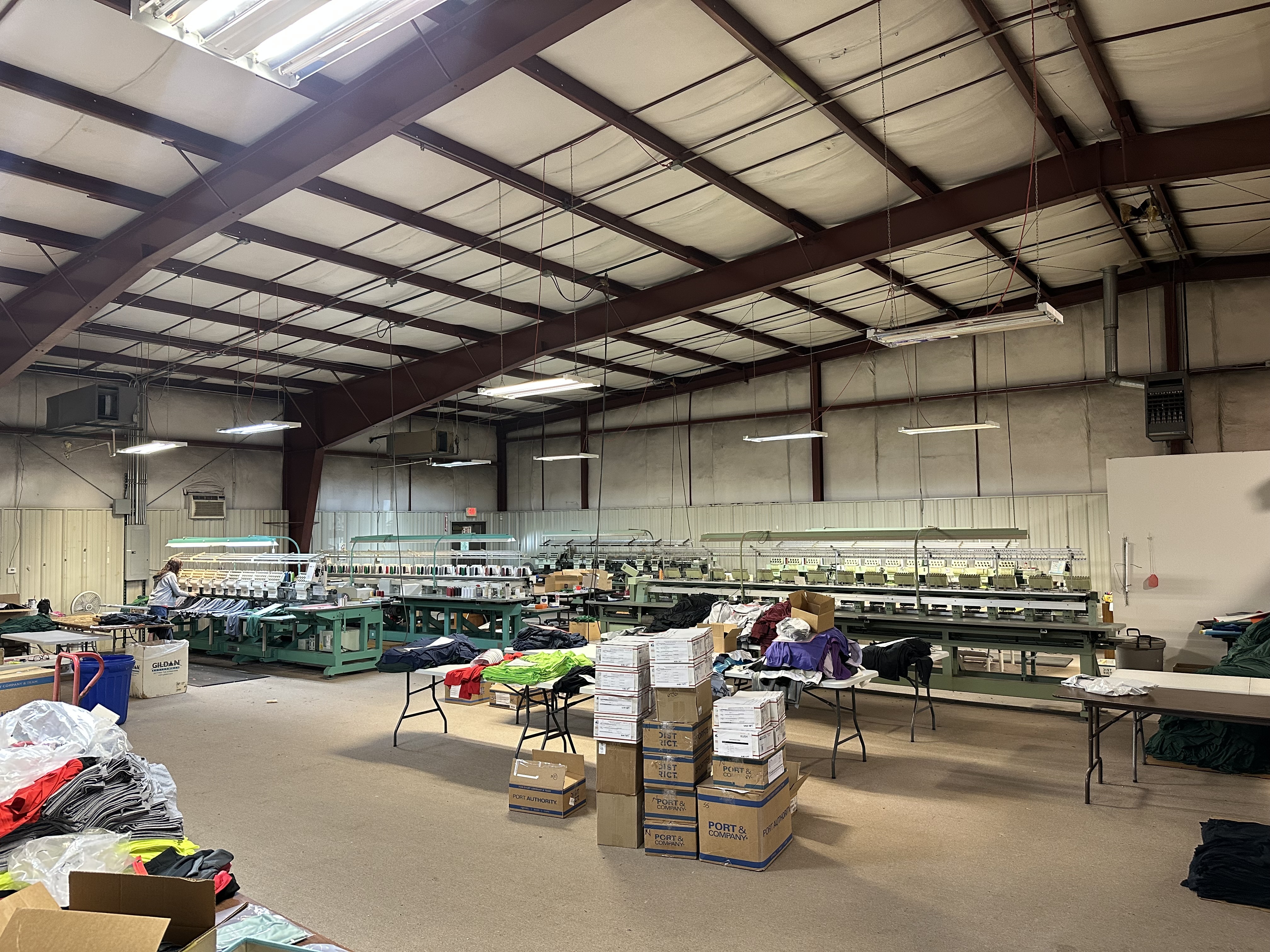 NAS embroidery machines producing custom apparel