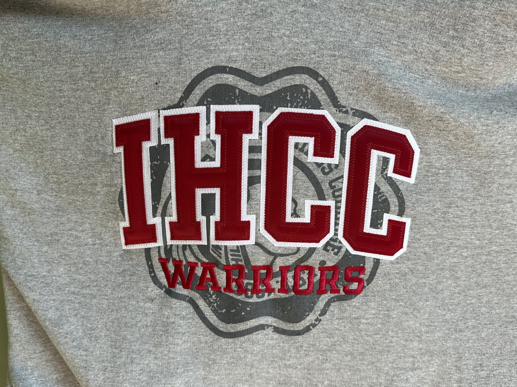 IHC Warriors appliqué and embroidery detail